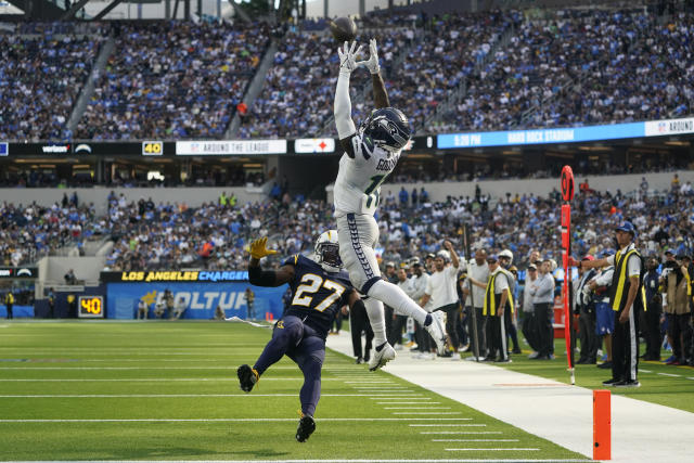 Seattle Seahawks wide receiver Marquise Goodwin runs with the ball during  an NFL football game against the Las Vegas Raiders, Sunday, Nov. 27, 2022,  in Seattle.The Raiders won 40-34 in overtime. (AP