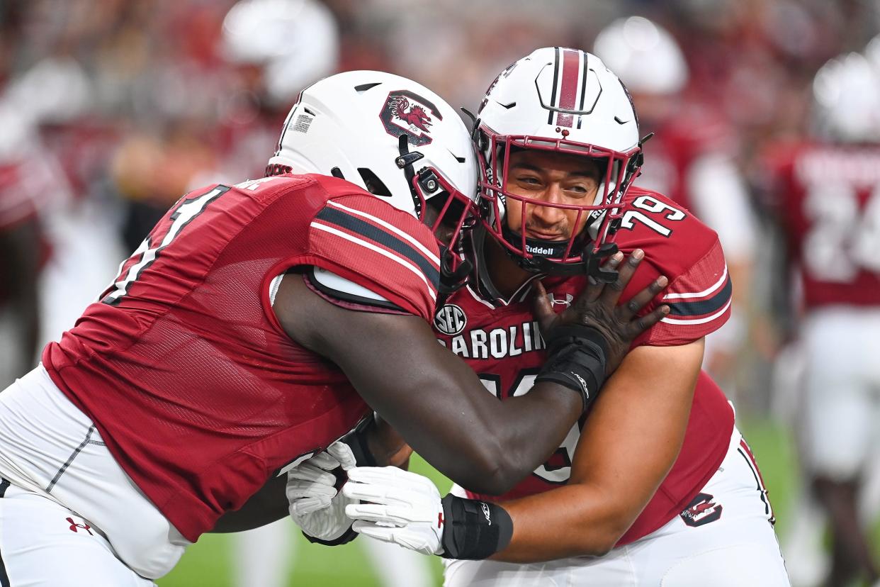 Offensive tackle Jaxon Hughes (79), shown warming up for a South Carolina game last season, has committed to Texas Tech as a transfer. Hughes has one year of eligibility remaining after four seasons at North Carolina-Charlotte and one at South Carolina.