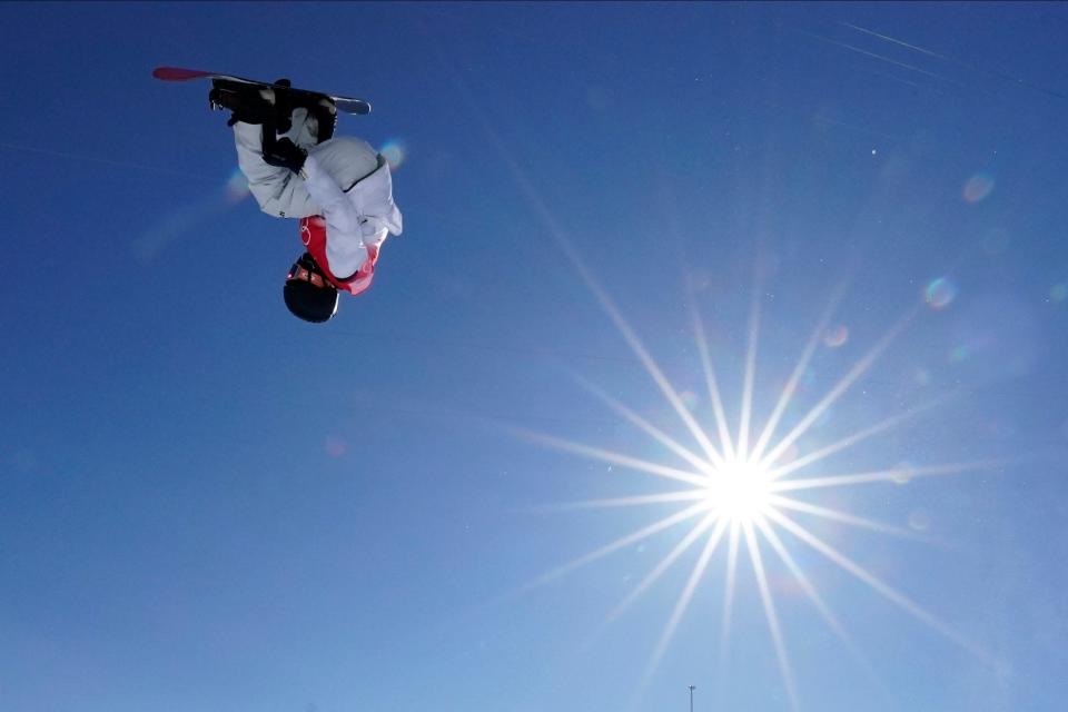 Japan&#39;s Ayumu Hirano trains on the Olympic halfpipe course on Tuesday in Zhangjiakou.