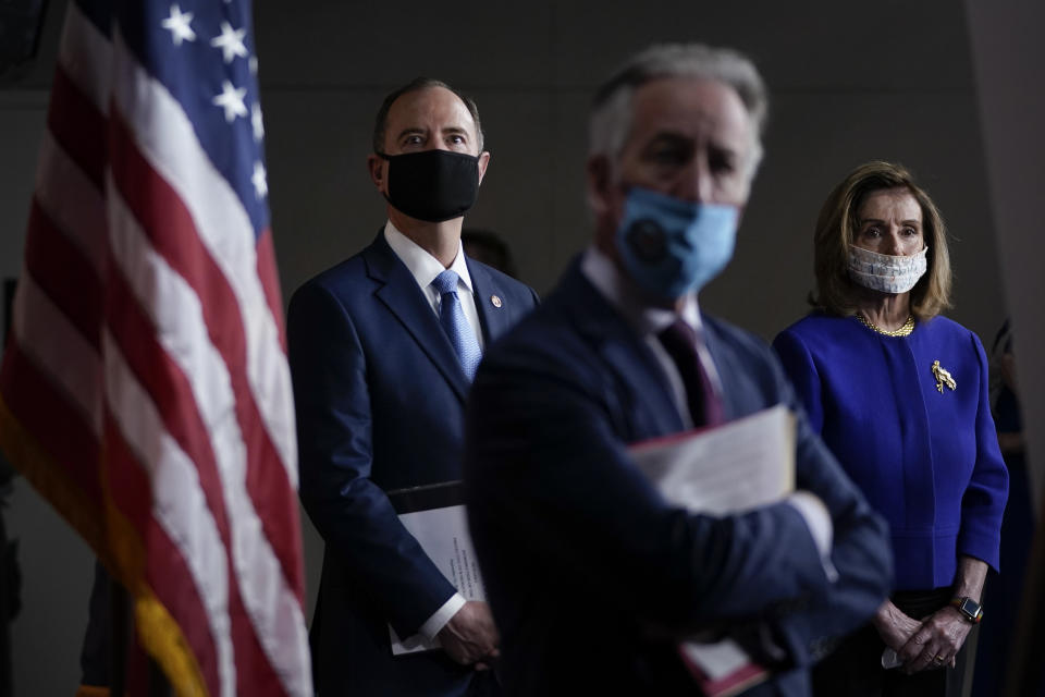 WASHINGTON, DC - SEPTEMBER 23: (L-R) Rep. Adam Schiff (D-CA), Rep. Richard Neal (D-MA) and Speaker of the House Nancy Pelosi (D-CA) attend a news conference at the U.S. Capitol on September 23, 2020 in Washington, DC. Pelosi and fellow House Democrats introduced a package of sweeping reforms aimed at curbing presidential abuse of power. (Photo by Drew Angerer/Getty Images)