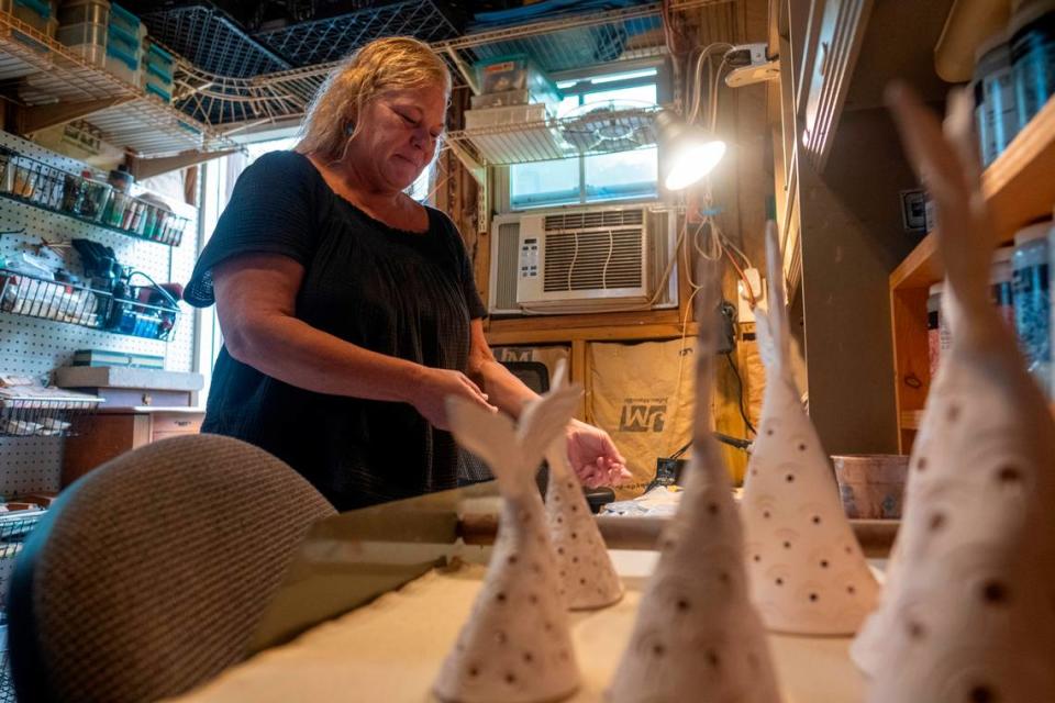 Pawley’s Island artist Christina Bowman Roberts crafts pottery and wood burnings taking cues from the local environment. Her recent work includes pottery Christmas trees, mermaid tail trees and shell ornaments. The artist’s work is sold at Sand + Sea Beach Co. in Litchfield Beach, S.C., S.C. September, 21, 2023.