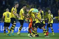 Football Soccer - Borussia Dortmund v SC Freiburg - German Bundesliga - Signal Iduna Park, Dortmund, Germany - 23/09/16 Borussia Dortmund players celebrate after match. RUTERS/Thilo Schmuelgen