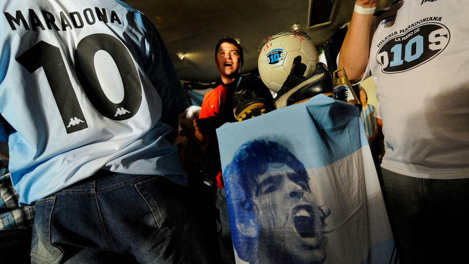 Maradona memorabilia is seen here being adorned by fans in Argentina.