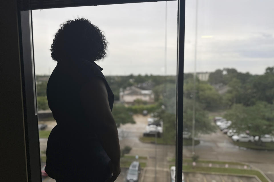 Louisiana Democratic state Rep. Delisha Boyd looks out the window in her office May 3, 2024, in New Orleans. As Boyd faces an uphill battle in Louisiana, as she attempts to advance a bill that would add cases of rape and incest as exceptions to Louisiana's near total abortion ban, the Democrat opens opening up about her mother's harrowing story and how it effected them. (AP Photo/Stephen Smith)