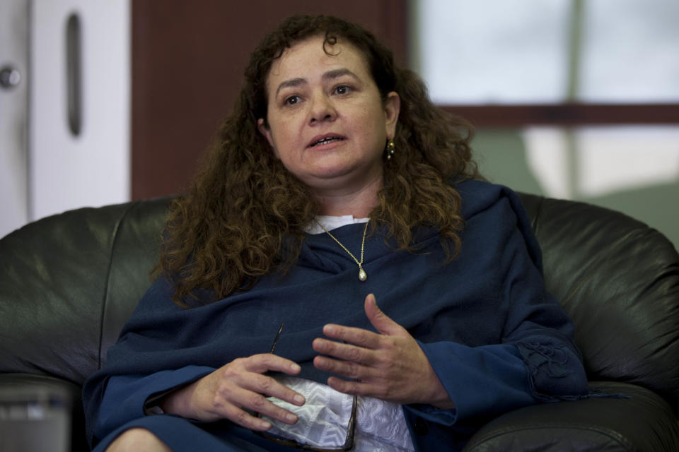 Guatemala's Attorney General Claudia Paz y Paz speaks during an interview at her office in Guatemala City, Monday, Feb. 10, 2014. Guatemala's Supreme Court upheld its ruling that the country's crusading attorney general must step down in May, seven months before her term was to end, drawing complaints from human rights activists who back her efforts to prosecute civil war-era military officials. (AP Photo/Moises Castillo)