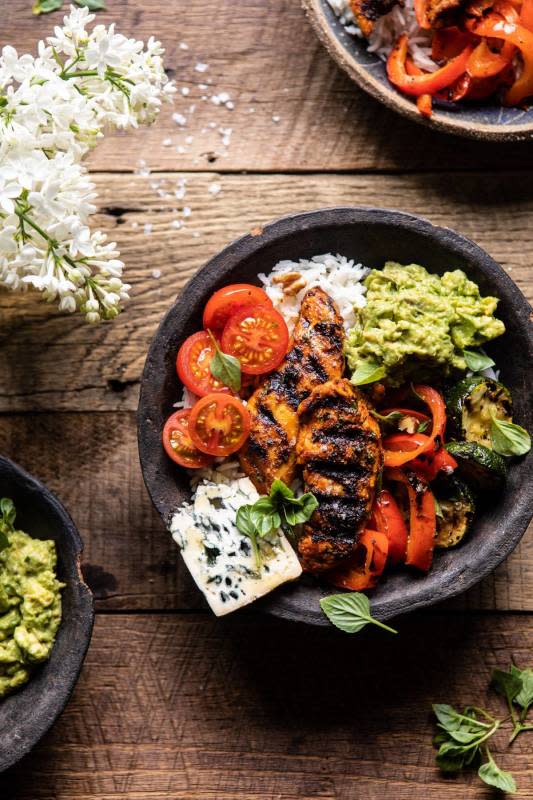 <p>Half Baked Harvest</p><p>Spice-rubbed grilled chicken served up bowl style with grilled peppers, zucchini, mashed avocado, tomatoes and crumbled cheese. This easy, healthy, chicken and rice bowl is made almost entirely on the grill in under 30 mins.</p><p><strong>Get the recipe: <a href="https://www.halfbakedharvest.com/california-chicken-veggie-avocado-and-rice-bowls/" rel="nofollow noopener" target="_blank" data-ylk="slk:California Chicken, Veggie, Avocado and Rice Bowls;elm:context_link;itc:0;sec:content-canvas" class="link rapid-noclick-resp">California Chicken, Veggie, Avocado and Rice Bowls</a></strong></p>