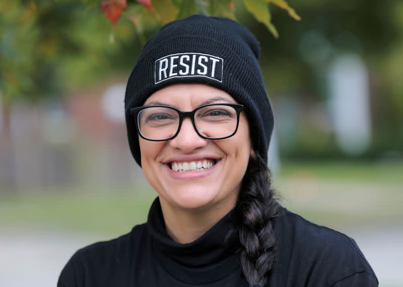 FILE PHOTO: Democratic Rep. Rashida Tlaib knocks on doors to encourage residents to vote in Detroit