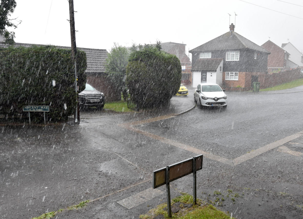 Heavy rain in Billericay, Essex during a brief but heavy storm. A yellow warning for storms has been issued by the Met Office for parts of the East Midlands, South East and East of England from 1pm on Tuesday until the end of the day. Picture date: Tuesday July 20, 2021.