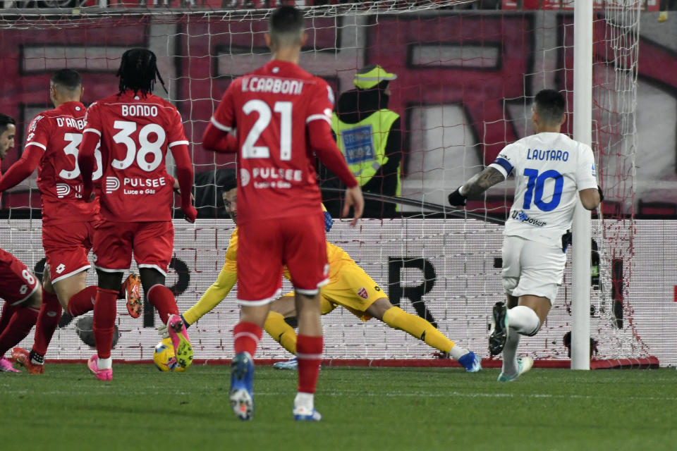 Inter's Lautaro Martinez, right, in action during the Italian Serie A soccer match between Monza and Inter at U-Power Stadium in Monza, Italy, Saturday Jan. 13, 2024. (Claudio Grassi/LaPresse via AP)