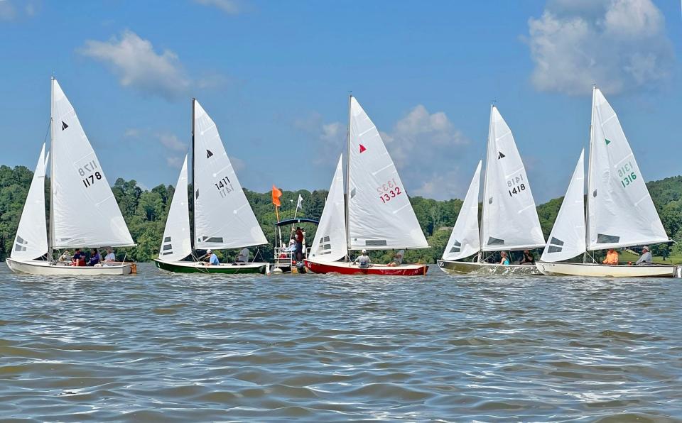Sailors line their vessels up and jockey for position before the start of the Friday session of the Interlake Sailing Class Association National’s Regatta. Jason J. Molyet/News Journal