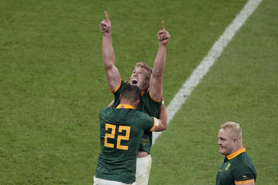 South Africa's team players celebrate after they won the Rugby World Cup quarterfinal match between France and South Africa at the Stade de France in Saint-Denis, near Paris, Sunday, Oct. 15, 2023. (AP Photo/Themba Hadebe)