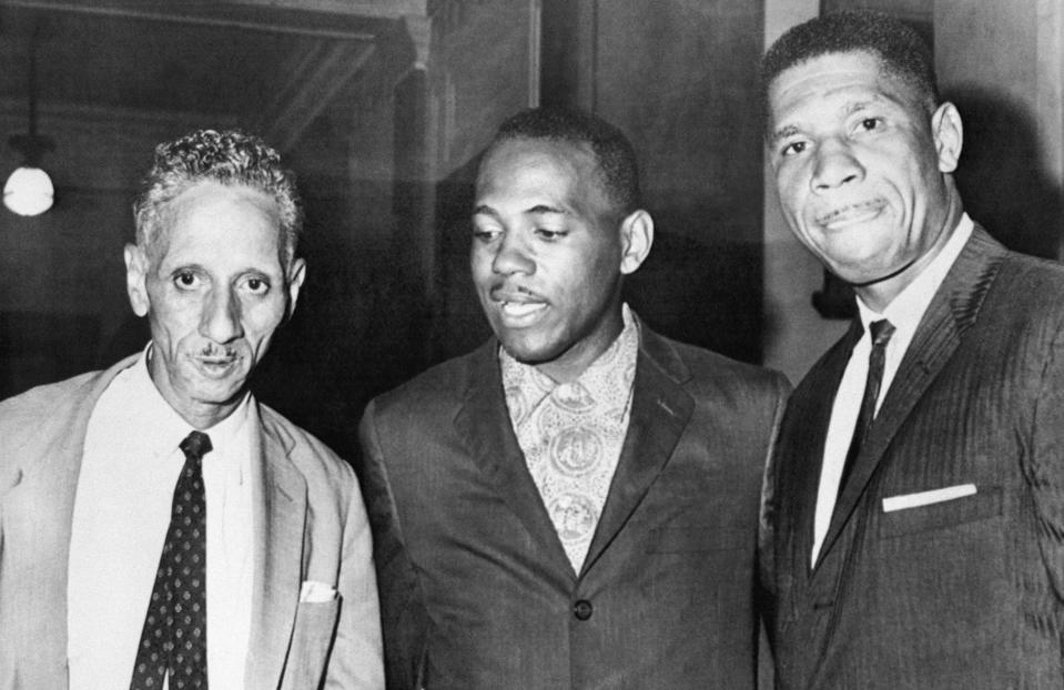 James H. Meredith, center, 29, who wants to enroll at the University of Mississippi, is shown with R. Jess Brown, Meredith's attorney, left, and Medgar Evers, field secretary of the National Association for Advancement of Colored People, Sept. 25, 1962.