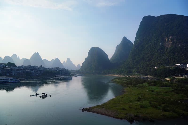 General view of the Li River by Yangshuo town against the backdrop of the karst landscape