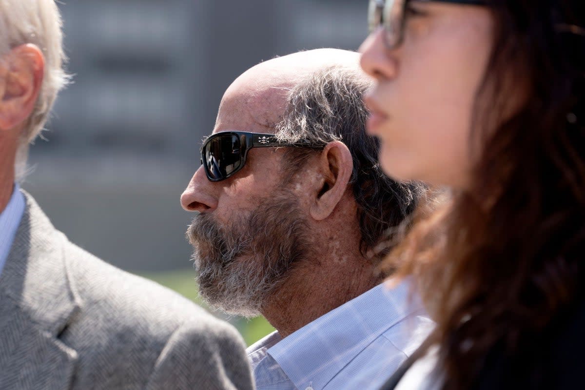 Defendant Jerry Boylan (centre), captain of the Conception, leaves federal court in Los Angeles (AP)