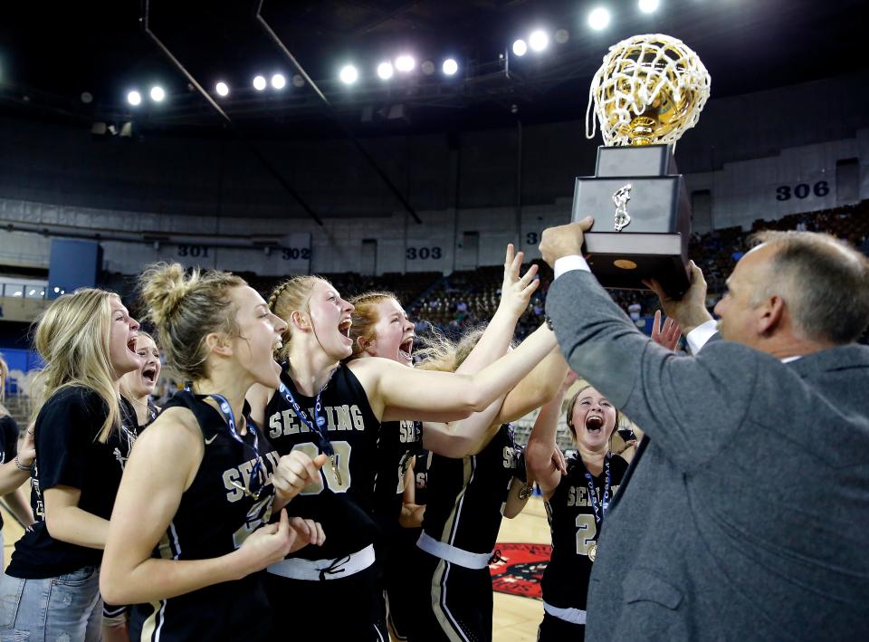 Seiling celebrates after beating Hydro-Eakly for the Class A girls basketball state championship Saturday at State Fair Arena.