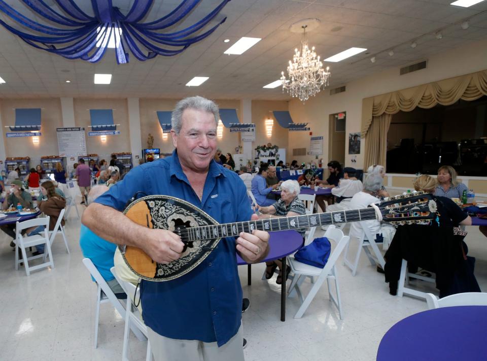 A musician serenades the crowd on the Bouzouki at the 2022 edition of the annual St Demetrios Greek Festival in Daytona Beach. The popular event returns for a four-day run starting Thursday in Daytona Beach.