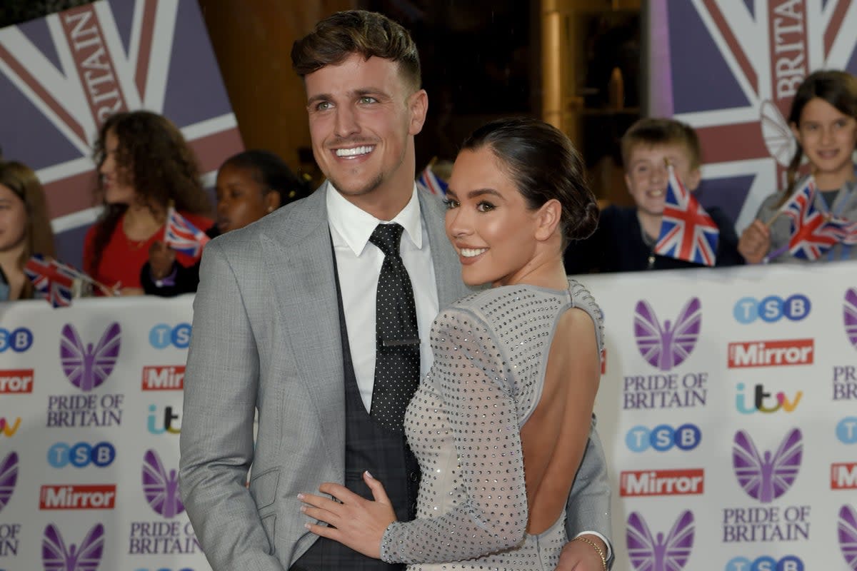 Love Island couple Gemma Owen and Luca Bish put on a loved-up display at the 2022 Pride of Britain Awards  (Getty Images)