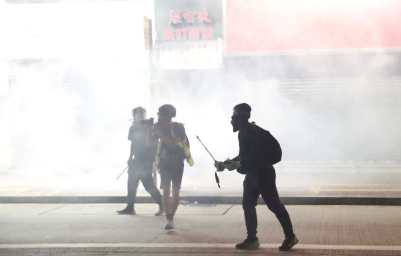 Hong Kong police fire tear gas in feverish start to 22nd weekend of protests in Hong Kong