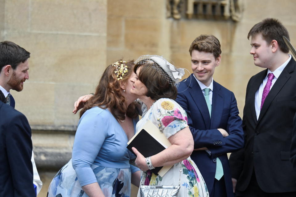 Former British Prime Minister Tony Blair's wife Cherie Blair embraces her daughter Kathryn Blair as sons Euan, Leo and Nicky Blair look, during the Order of the Garter Service at St. Georges's Chapel, at Windsor Castle, Britain, June 13, 2022. REUTERS/Toby Melville/Pool