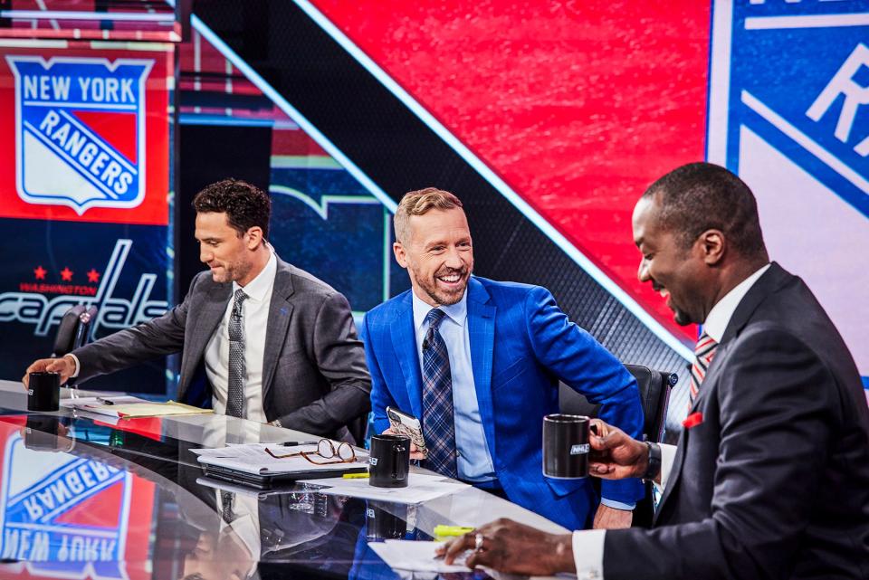 Anson Carter, right, and Paul Bissonnette, left, signed extensions to continue their work in-studio for TNT's NHL coverage.