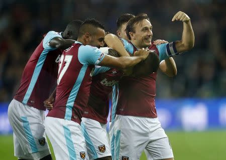 Football Soccer Britain - West Ham United v Chelsea - EFL Cup Fourth Round - London Stadium - 26/10/16 West Ham United's Edimilson Fernandes celebrates scoring their second goal with team mates Reuters / Eddie Keogh