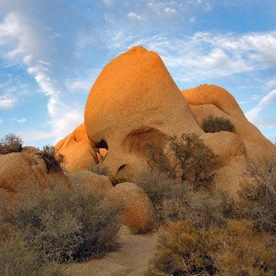 Skull Rock is a popular spot for visitors to stop along Joshua Tree National Park's east-west road.