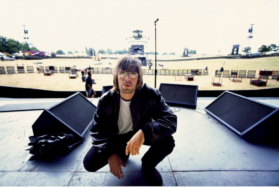 Jill Furmanovsky’s shot of Liam Gallagher at rehearsals for Oasis’s Knebworth shows , 1996 (JILL FURMANOVSKY ARCHIVE)