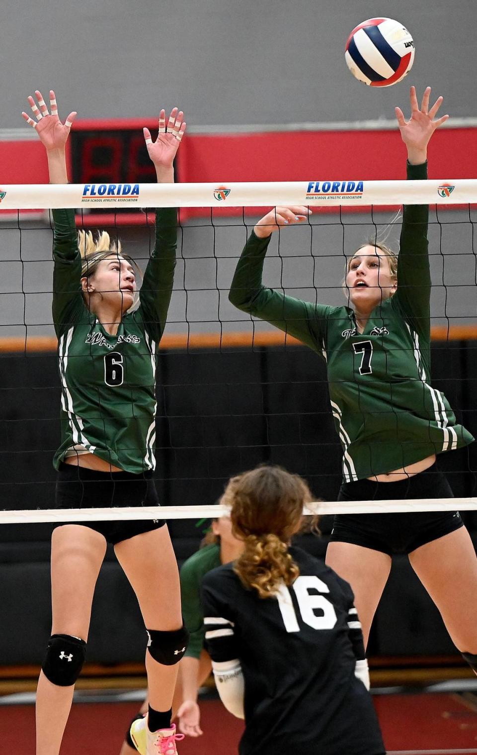 Westminster Christian School players go for a block at the net during their Class 3A state championship match against Clearwater Central Catholic at Polk State College on Sunday November 13th, 2022.