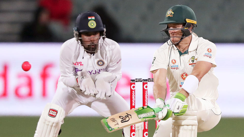 Seen here, Tim Paine plays a shot against India on day two of the first Test in Adelaide. 