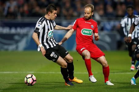 Soccer Football - SCO Angers v EA Guingamp - French Cup Semi-Final - Raymond Kopa Stadium, Angers, France - 25/04/2017. Guingamp's Etienne Didot and Angers' Baptiste Santamaria in action. REUTERS/Stephane Mahe -