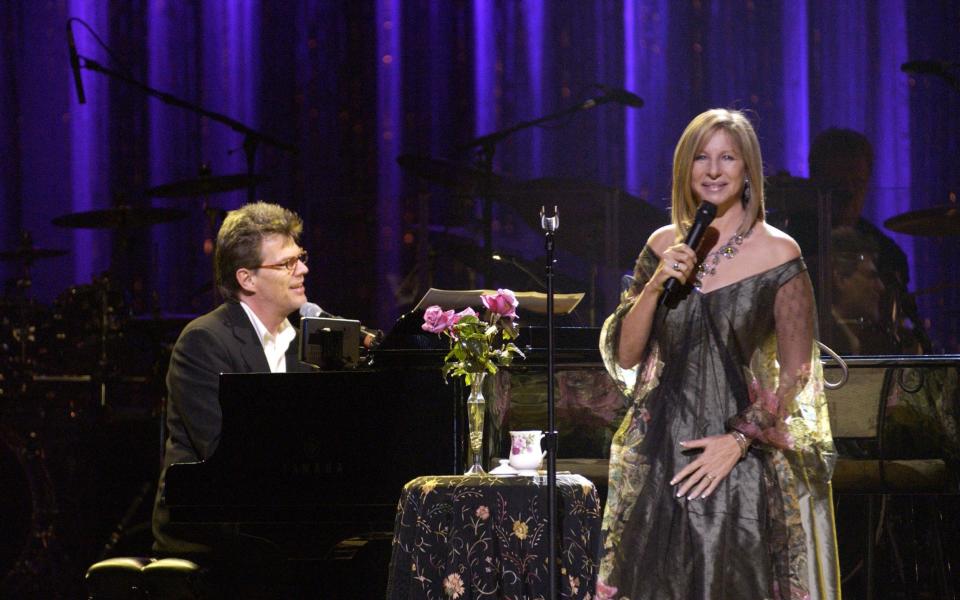 David Foster performing with Barbra Streisand in 2002