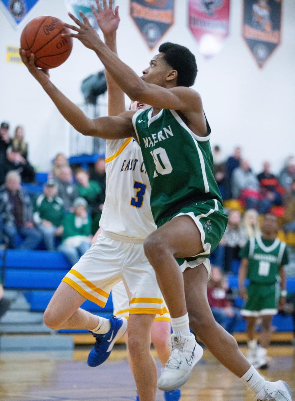 Malvern's J'Allen Barrino, going up for a shot at East Canton last season, is the IVC North Player of the Year for the 2023-24 season.