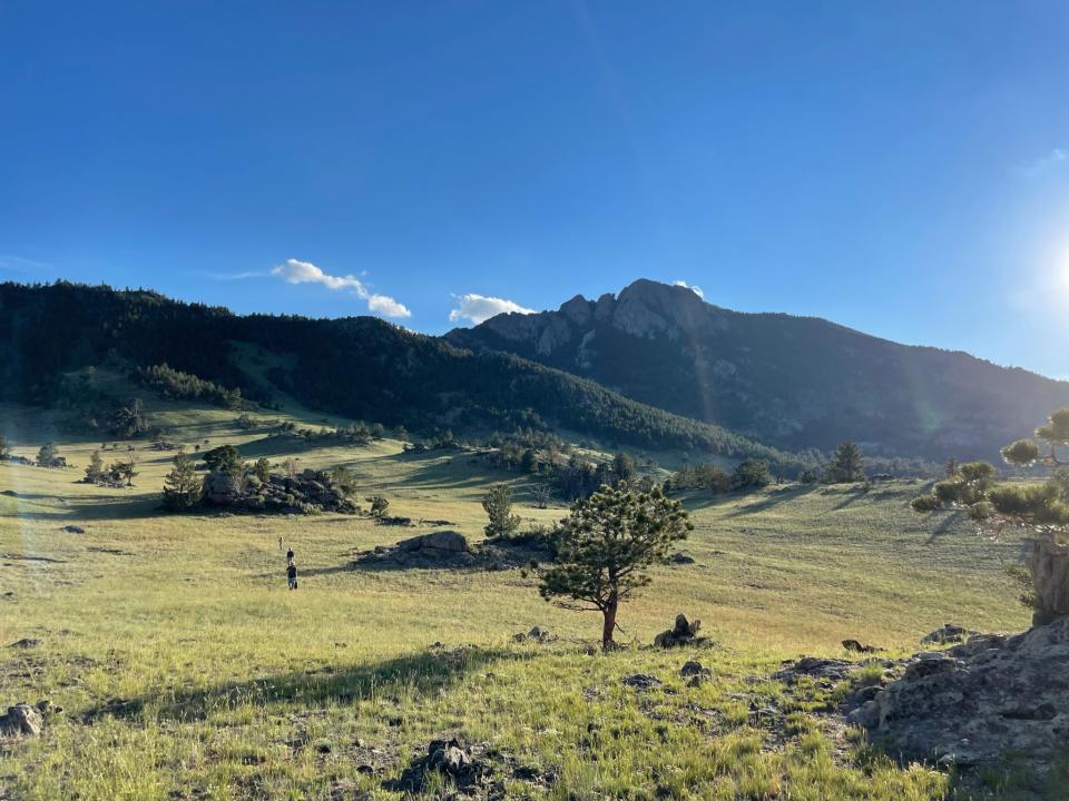 The property at Reid Creek Lodge in Wyoming offers a multitude of outdoor excursion opportunities like hiking up this mountain. Parent company CEO Andrea Nicholas Perdue says more and more travelers are vacationing in groups and looking for outdoor adventures they can do together. She defines adventure as "a palpable, intense desire for inspiration."