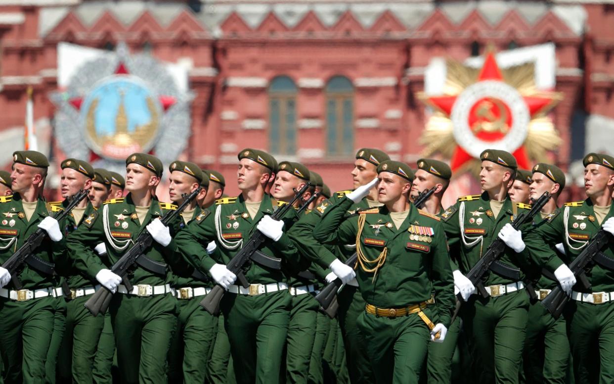 Russian soldiers march across Red Square during the Victory Day parade in Moscow - Alexander Zemlianichenko/AP