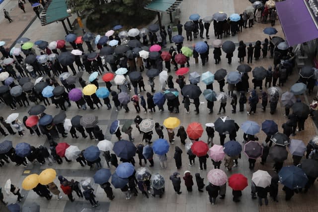 People queuing to buy face masks in Seoul, South Korea