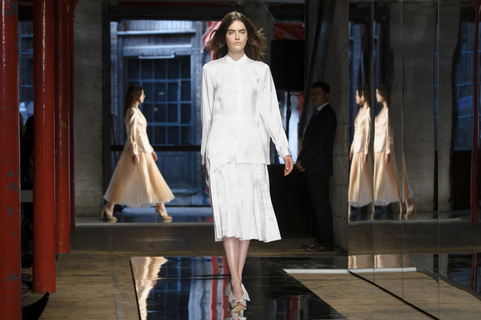 A model wears a design created by Christopher Kane during London Fashion Week Spring/Summer 2014, at the Farmiloe Building in central London, Monday, Sept. 16, 2013. (Photo by Jonathan Short/Invision/AP)