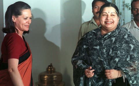 Sonia Gandhi (left), a driving force behind welfare reforms  - Credit: Jayanta Shaw REUTERS