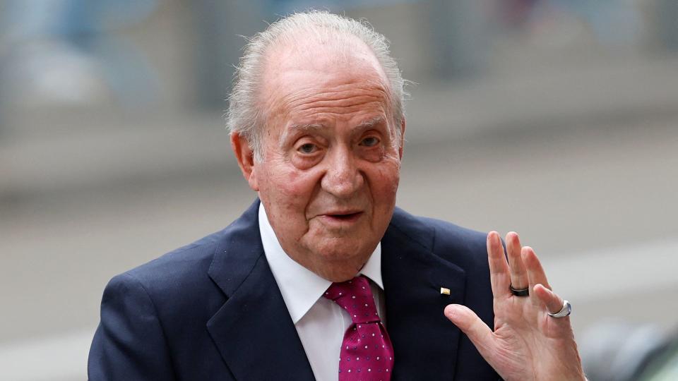 King Juan Carlos waving