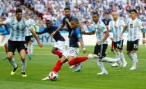 Soccer Football - World Cup - Round of 16 - France vs Argentina - Kazan Arena, Kazan, Russia - June 30, 2018 France's Kylian Mbappe scores their third goal REUTERS/Michael Dalder