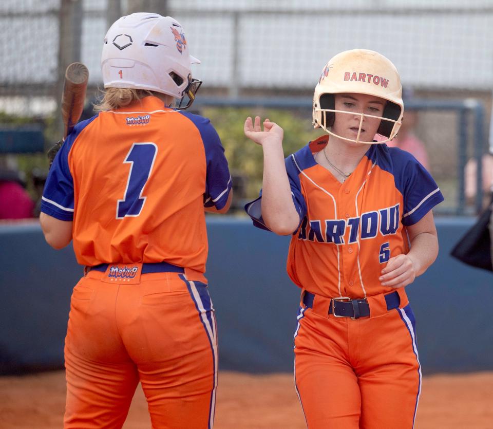 Bartow's Kynley Quartermaine is congratulated by Kyndal Cornelius after scoring against Lake Region on Saturday in the championship game in Bartow's Tournament of Champions.