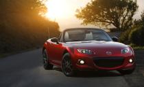 <p>To celebrate the MX-5 Miata's 25th anniversary, Mazda gins up a special edition wearing Soul Red paint, a black-painted windshield surround, black door mirrors, and dark-finished wheels. The seats and door panels wear almond-colored leather, and a satin-metal-like trim adorns the dashboard. Although the 25th Anniversary models aren't officially any more powerful than their regular brethren, Mazda claims to have handpicked each one's engine components to ensure the internals were the lightest and most balanced possible. </p>