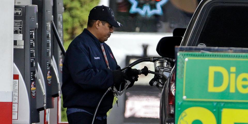 An attendant pumps gas at a station in Portland, Ore. in 2015.