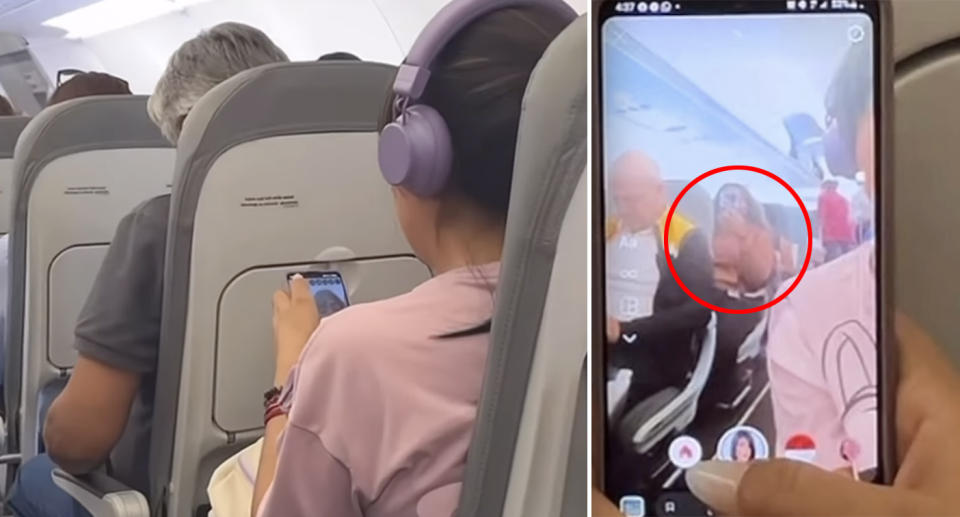 A woman films a passenger seated behind her on a flight.