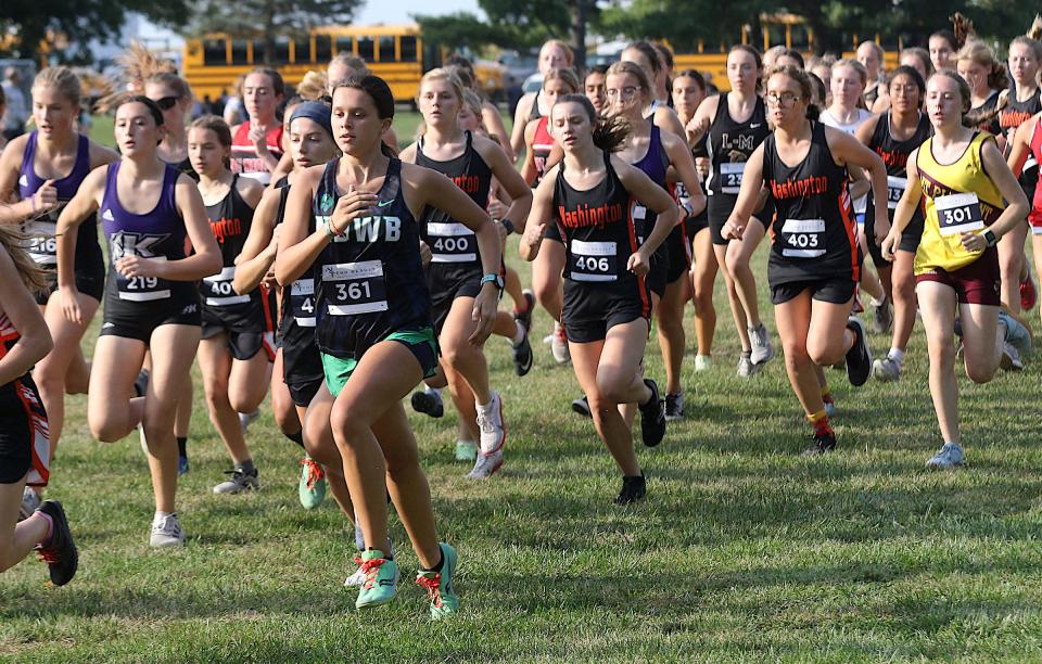 ND-WB’s Hannah Fruehling (361) keeps pace at the start in the Fort Madison Invitational Thursday at Rodeo Park in Fort Madison. Fruehling placed third in her class.