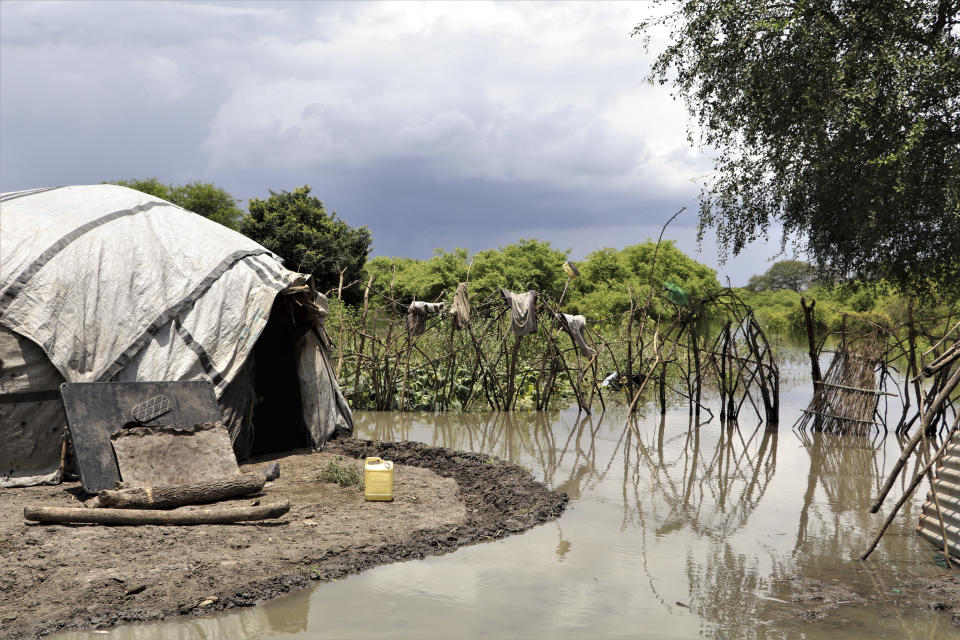 Flooding surrounds a house in Lenyari in the Greater Pibor Administrative Area, South Sudan Thursday, Sept. 10, 2020. Flooding has affected well over a million people across East Africa, another calamity threatening food security on top of a historic locust outbreak and the coronavirus pandemic. (Tetiana Gaviuk/Medecins Sans Frontieres via AP)