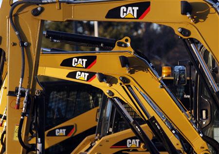 Caterpillar machines are pictured on a lot at Milton CAT in North Reading, Massachusetts in this January 23, 2013 file photo. REUTERS/Jessica Rinaldi/Files