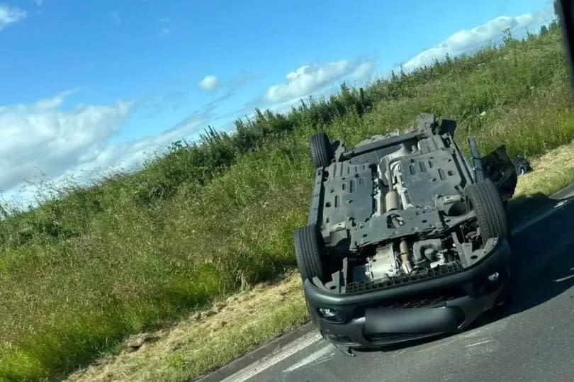 The car flipped onto its roof