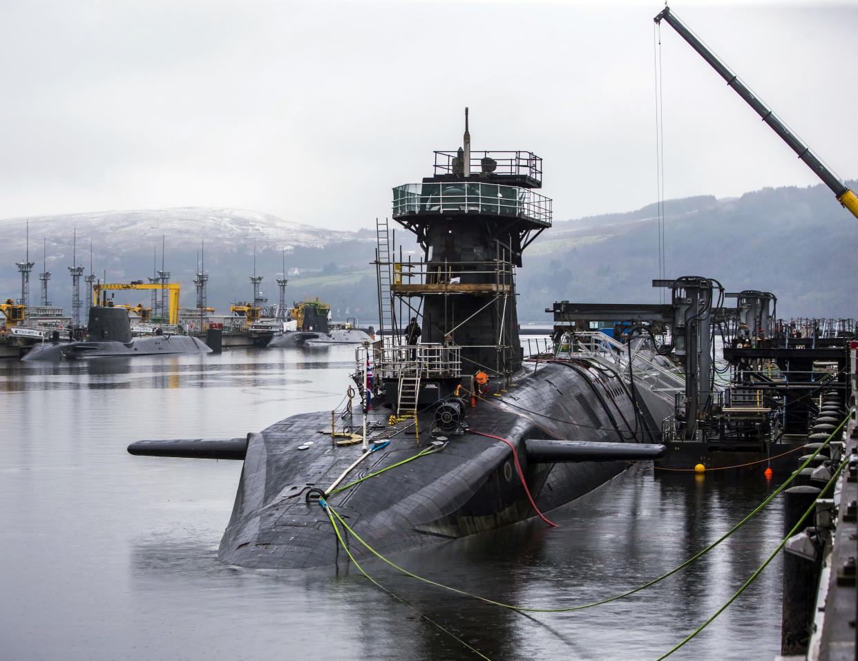 Embargoed to 0001 Friday January 10 File photo dated 20/01/16 of vanguard-class submarine HMS Vigilant (front right), one of the UK's four nuclear warhead-carrying submarines. The Whitehall spending watchdog has warned poor management of the infrastructure to build and maintain Britain�s Trident nuclear deterrent has led to years of delays and cost overruns of more than �1 billion.