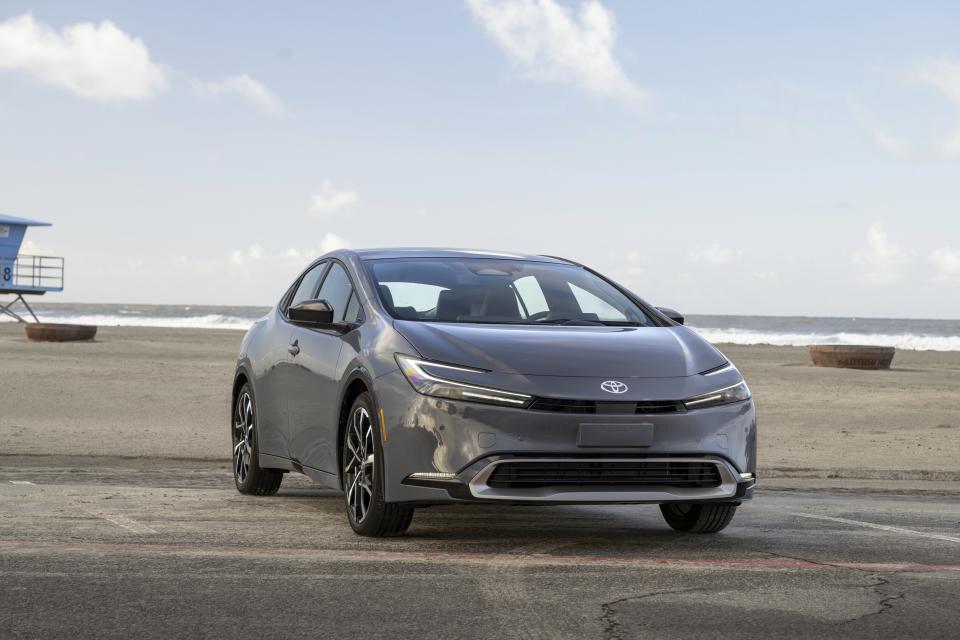 This photo provided by Toyota shows the 2024 Prius Prime. More powerful and stylish than before, the latest Prime can drive about 45 miles on all-electric power. (Courtesy of Toyota Motor Sales U.S.A. via AP)