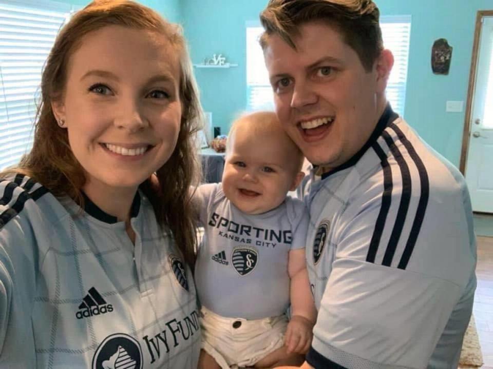 Cali and Matthew Clark with their 8-month-old daughter, Caroline Clark.